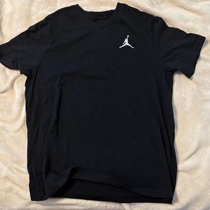 Men’s black Jordan shirt
Large, worn once.  Embroidered logo.